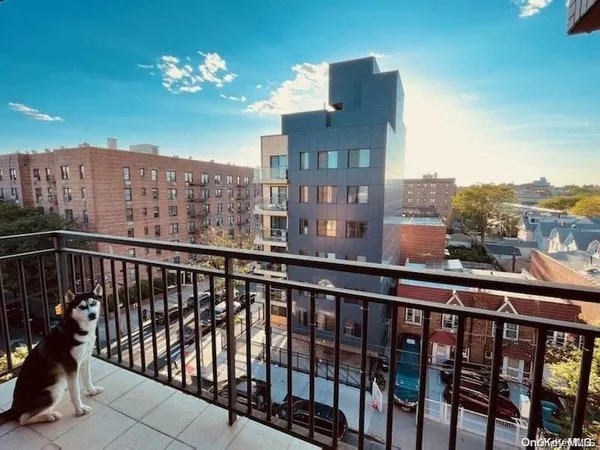 a view of a building from a balcony