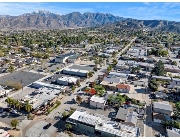 an aerial view of a city with lots of residential buildings