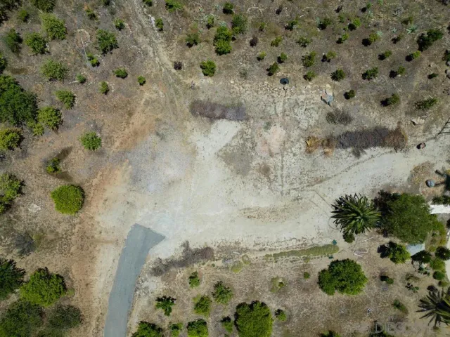 an aerial view of residential house with outdoor space