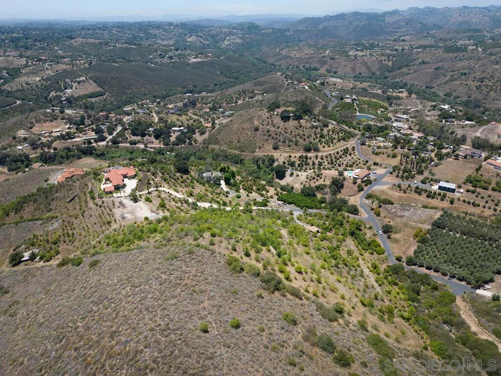 0 El Coyote Run, Unit PM02721 Fallbrook, CA 92028 - Photo 7 of 19 an aerial view of mountains with green space and fog