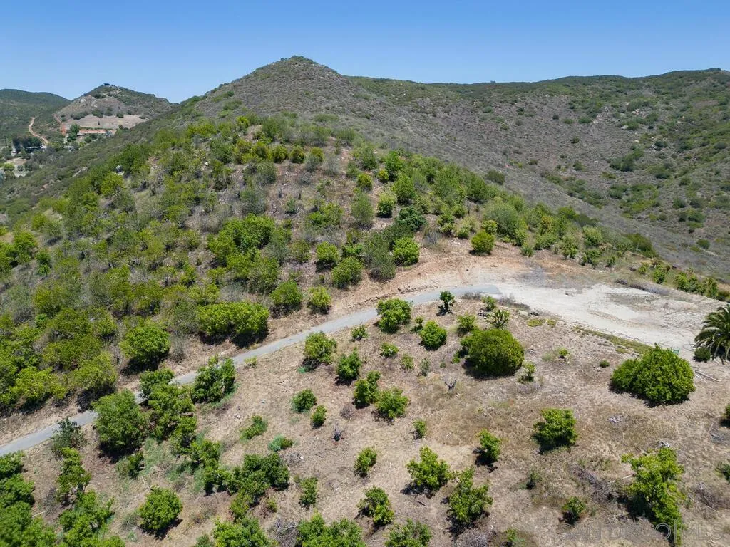 0 El Coyote Run, Unit PM02721 Fallbrook, CA 92028 - Photo 9 of 19 a view of a mountain with a field