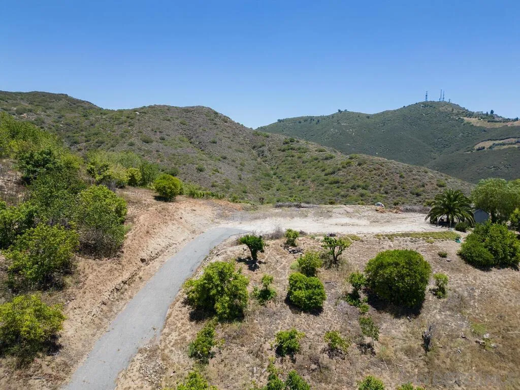 0 El Coyote Run, Unit PM02721 Fallbrook, CA 92028 - Photo 10 of 19 a view of a lake with mountains in the background