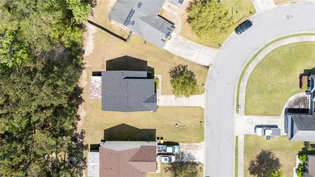 an aerial view of residential house with outdoor space