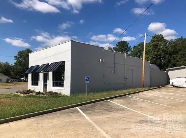 a house view with a backyard space