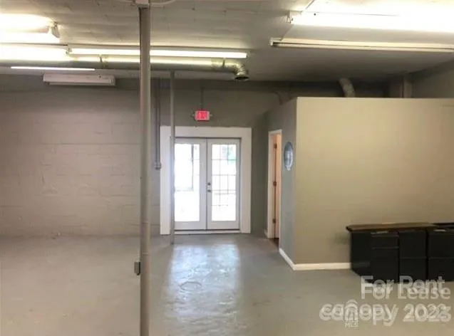 a view of a living room with a flat screen tv