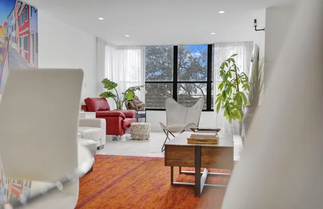 a bedroom with bed and furniture