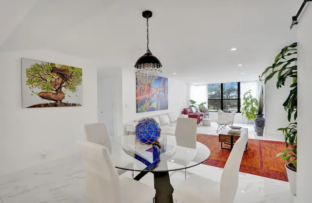 a bedroom with furniture and window