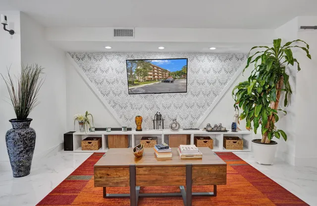 a white refrigerator freezer sitting inside of a kitchen