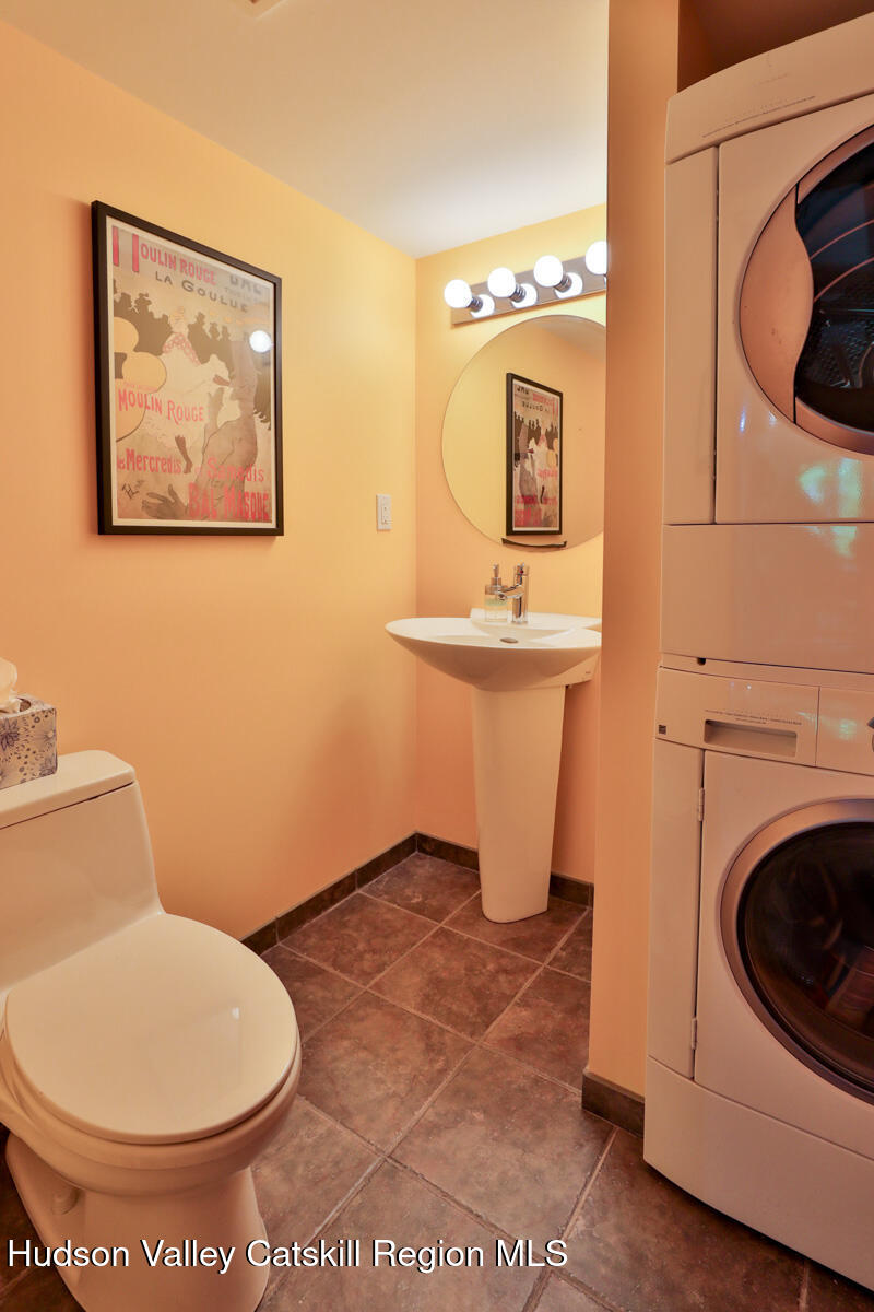 3 Quarry Road Shandaken, NY 12480 - Photo 19 of 29 a bathroom with a toilet a sink and mirror