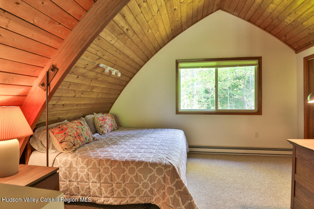 3 Quarry Road Shandaken, NY 12480 - Photo 25 of 29 a bedroom with a bed and a window