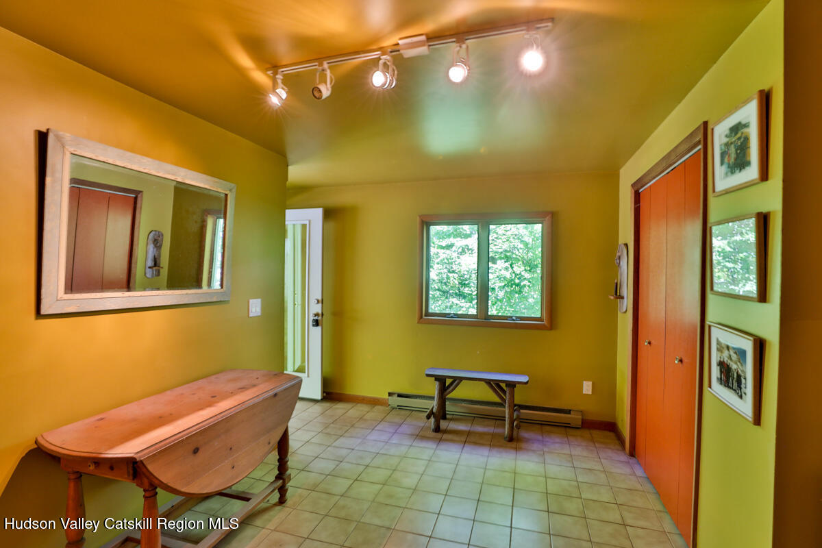 3 Quarry Road Shandaken, NY 12480 - Photo 7 of 29 a backyard of a house with barbeque oven table and chairs