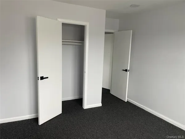an empty room with closet