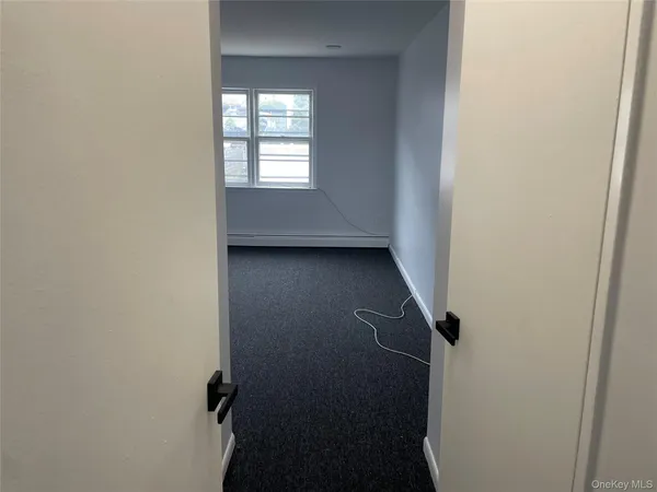 a view of a small space with a window