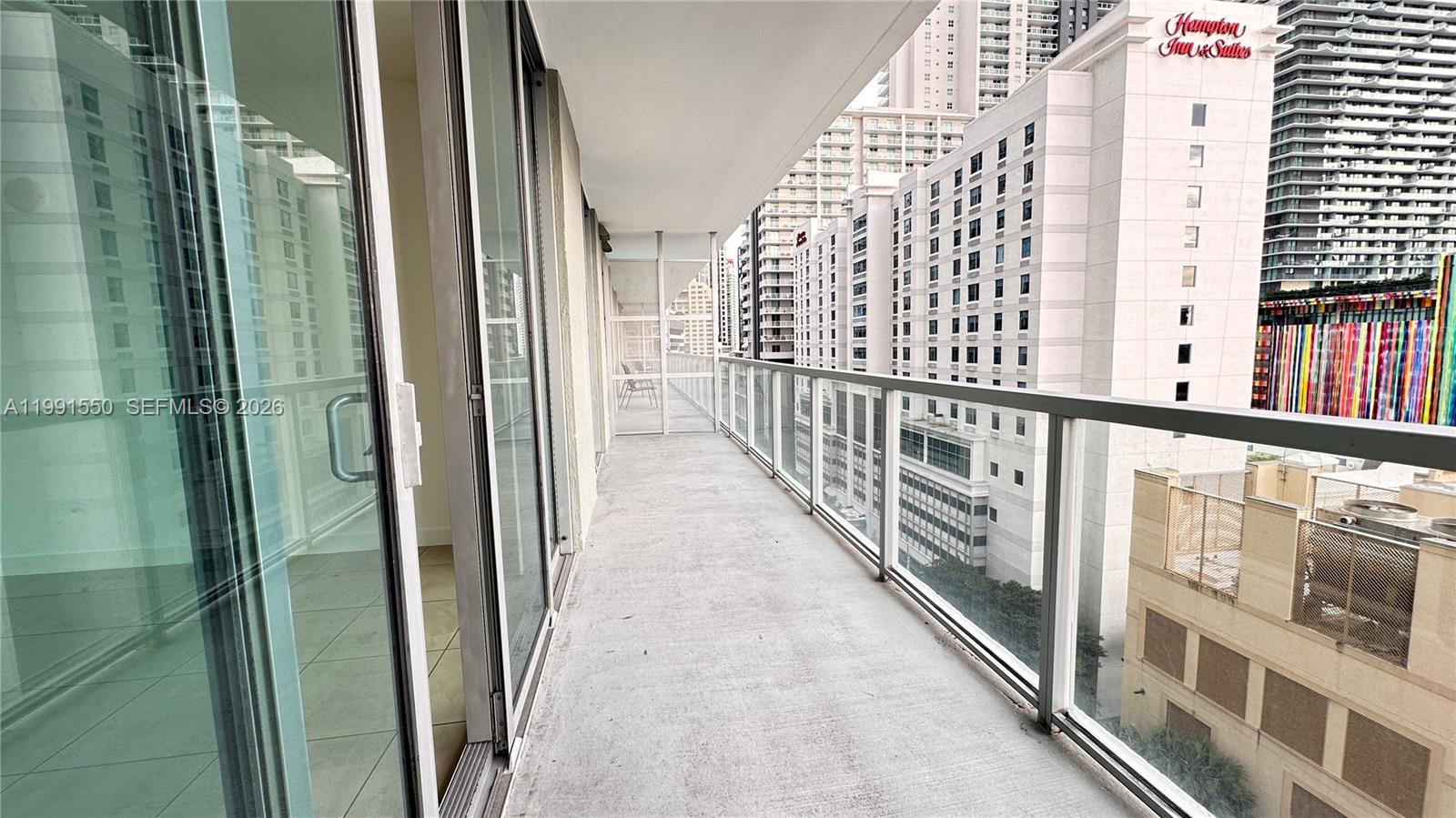 79 Southwest 12th Street, Unit 1102S Miami, FL 33130 - Photo 14 of 24 a view of balcony with stairs