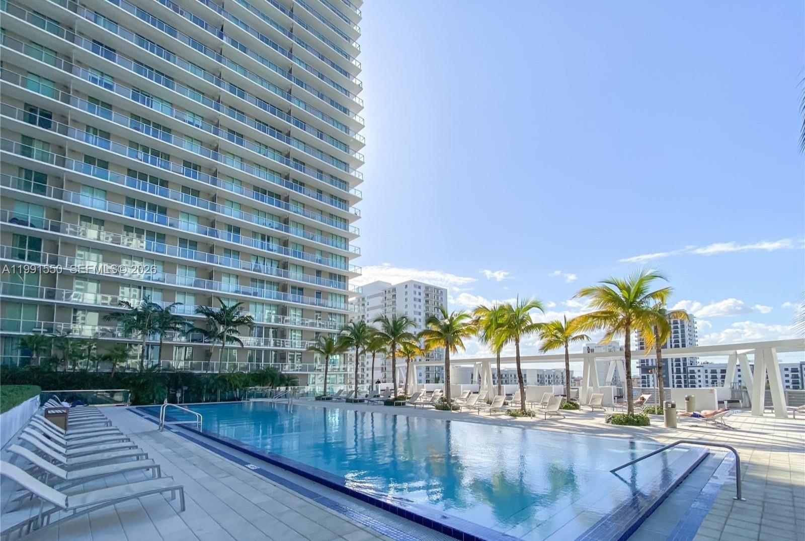 79 Southwest 12th Street, Unit 1102S Miami, FL 33130 - Photo 17 of 24 a view of a swimming pool and outdoor space