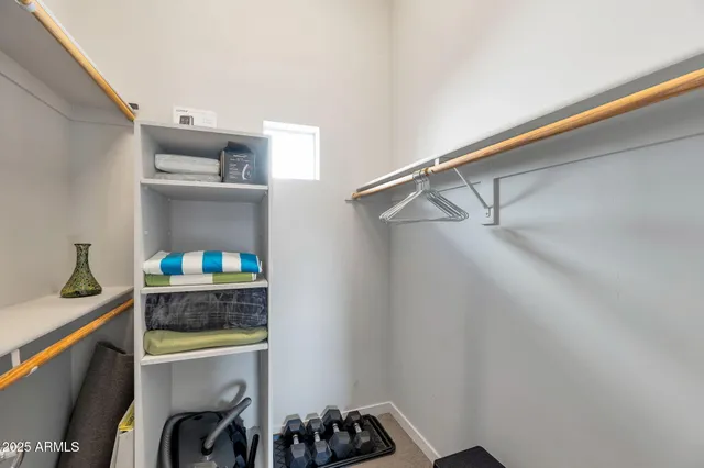 a kitchen with a refrigerator and a sink