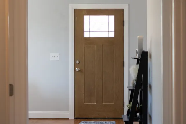 a view of front door deck of the house