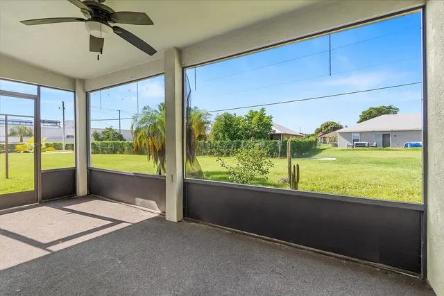 a view of an empty room and window