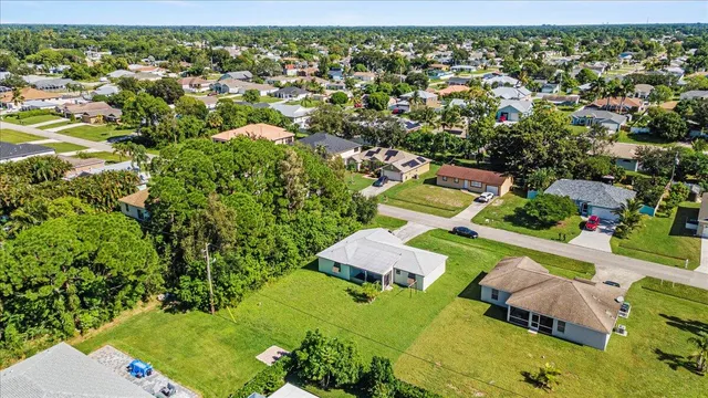 an aerial view of a house with a garden