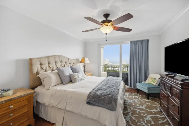 a bedroom with a bed and lamp