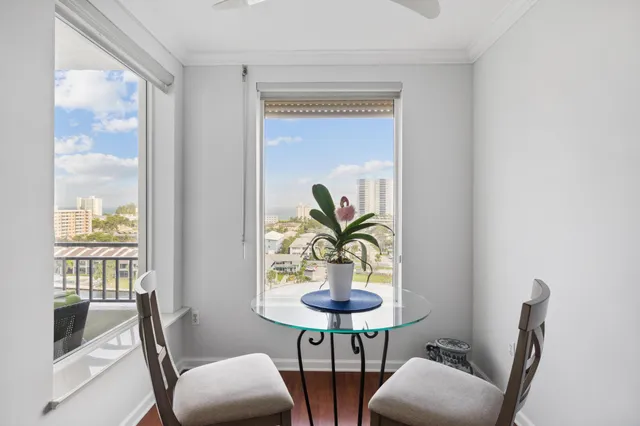 a kitchen with stainless steel appliances granite countertop a sink a stove top oven a counter space and cabinets