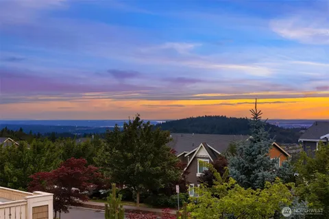 a view of a city with sunset view
