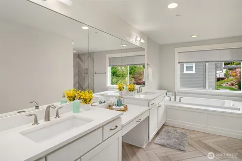 a bathroom with a sink and a bathtub