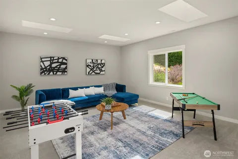 a bedroom with furniture and windows