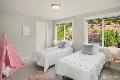 a bathroom with a sink a vanity and a mirror