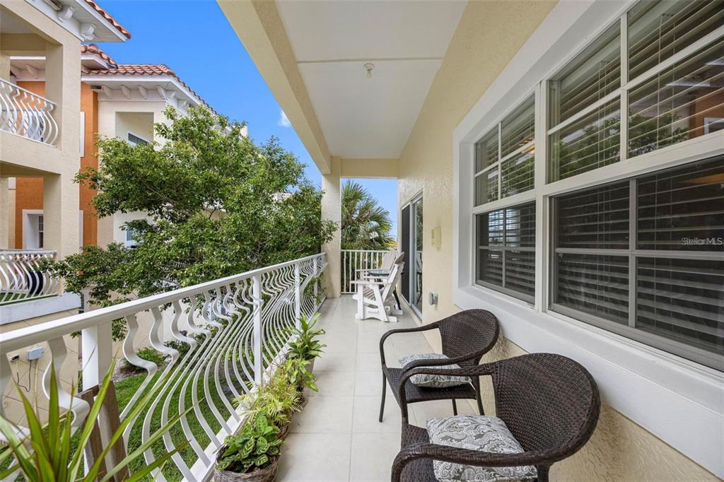 146 175th Terrace Drive East Redington Shores, FL 33708 - Photo 12 of 51 a view of balcony and patio