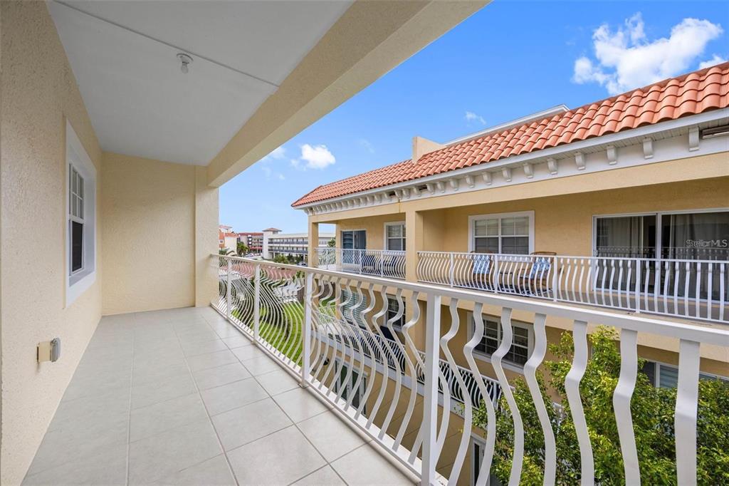 146 175th Terrace Drive East Redington Shores, FL 33708 - Photo 22 of 51 a view of a house with wooden deck