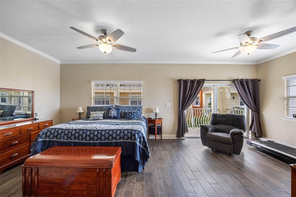 146 175th Terrace Drive East Redington Shores, FL 33708 - Photo 24 of 51 a bedroom with a bed and a couch