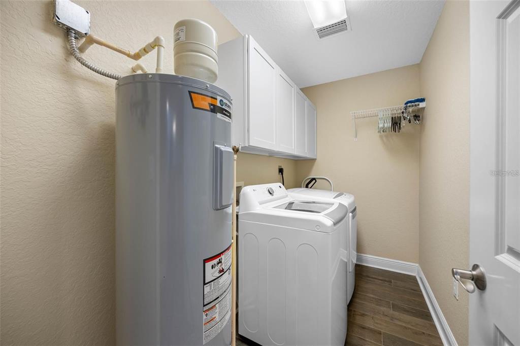 146 175th Terrace Drive East Redington Shores, FL 33708 - Photo 43 of 51 a utility room with dryer and washer
