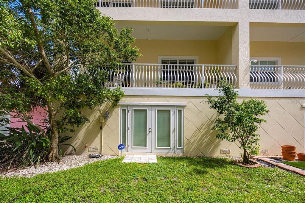 146 175th Terrace Drive East Redington Shores, FL 33708 - Photo 46 of 51 a view of a house with a yard and plants