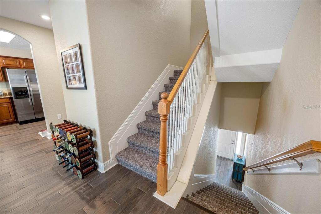 146 175th Terrace Drive East Redington Shores, FL 33708 - Photo 5 of 51 a view of an entryway with wooden floor