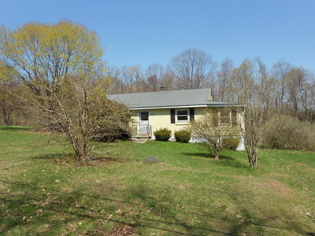107 Slab Meadow Road Morris, CT 06763 - Photo 1 of 1 a view of a house with a yard