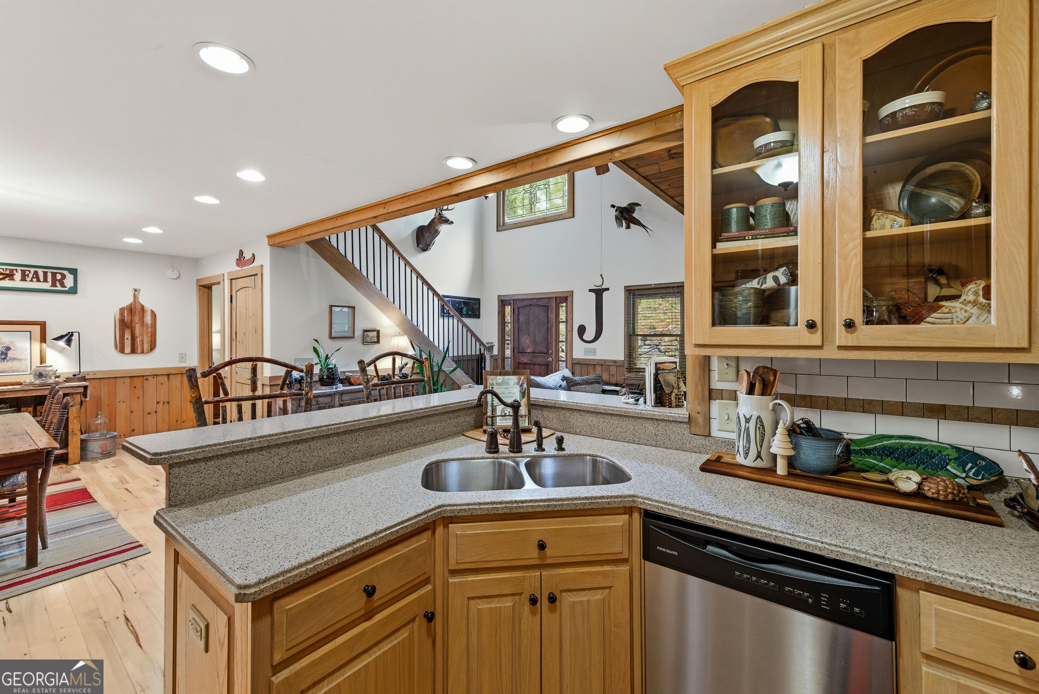 634 Little Hawk Road Sautee Nacoochee, GA 30571 - Photo 13 of 54 a kitchen with a sink appliances cabinets and a large window