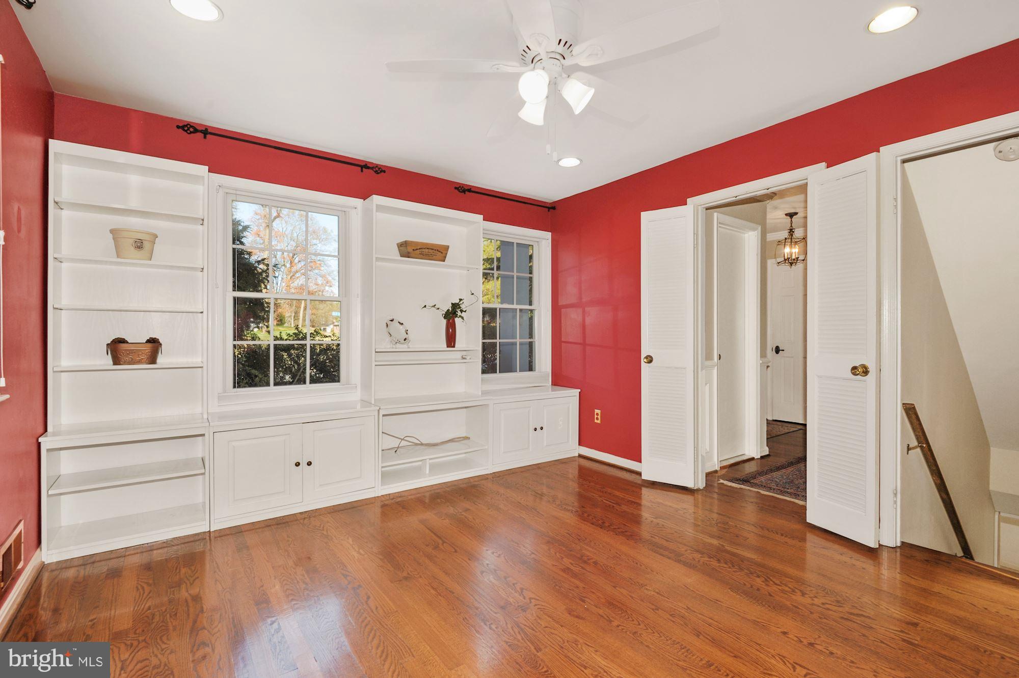 2101 Old Stage Road Alexandria, VA 22308 - Photo 19 of 45 Den in kitchen + custom built ins