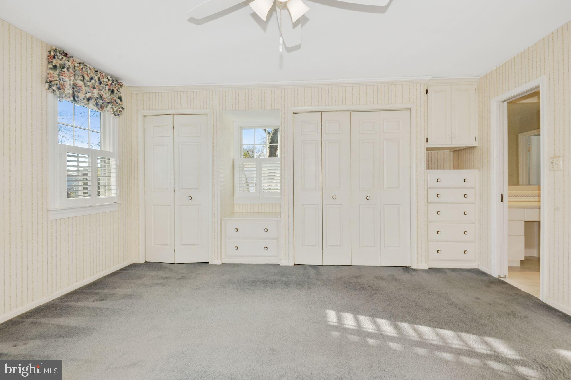 2101 Old Stage Road Alexandria, VA 22308 - Photo 27 of 45 Full wall of built-ins & closet & window seat