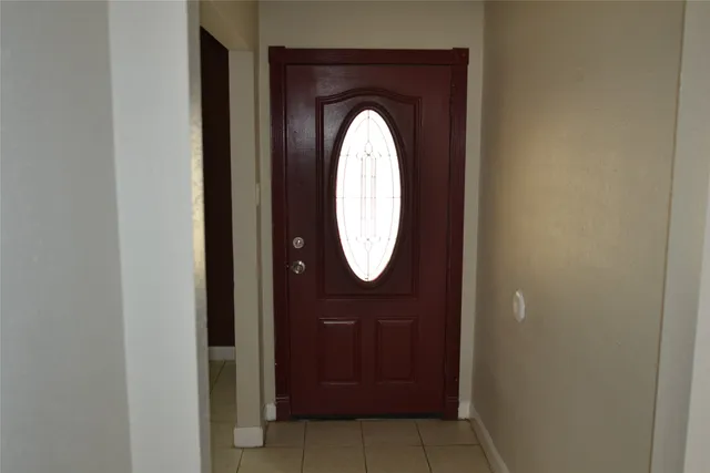 a bathroom with a mirror and a sink