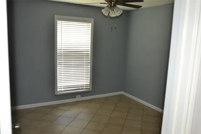 a view of a room that has a window in it