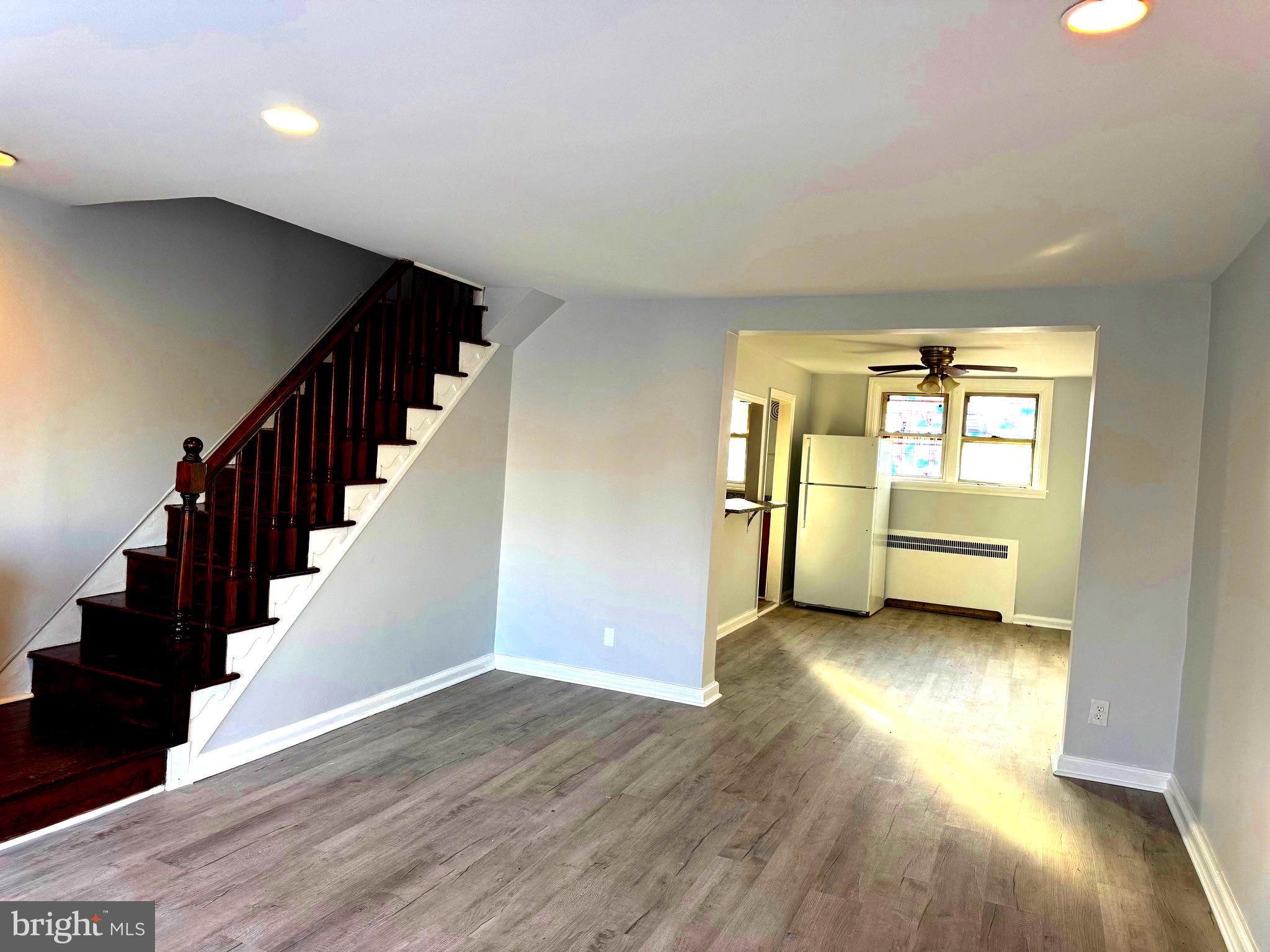 314 Copley Road Upper Darby, PA 19082 - Photo 4 of 11 a view of a room with wooden floor and windows