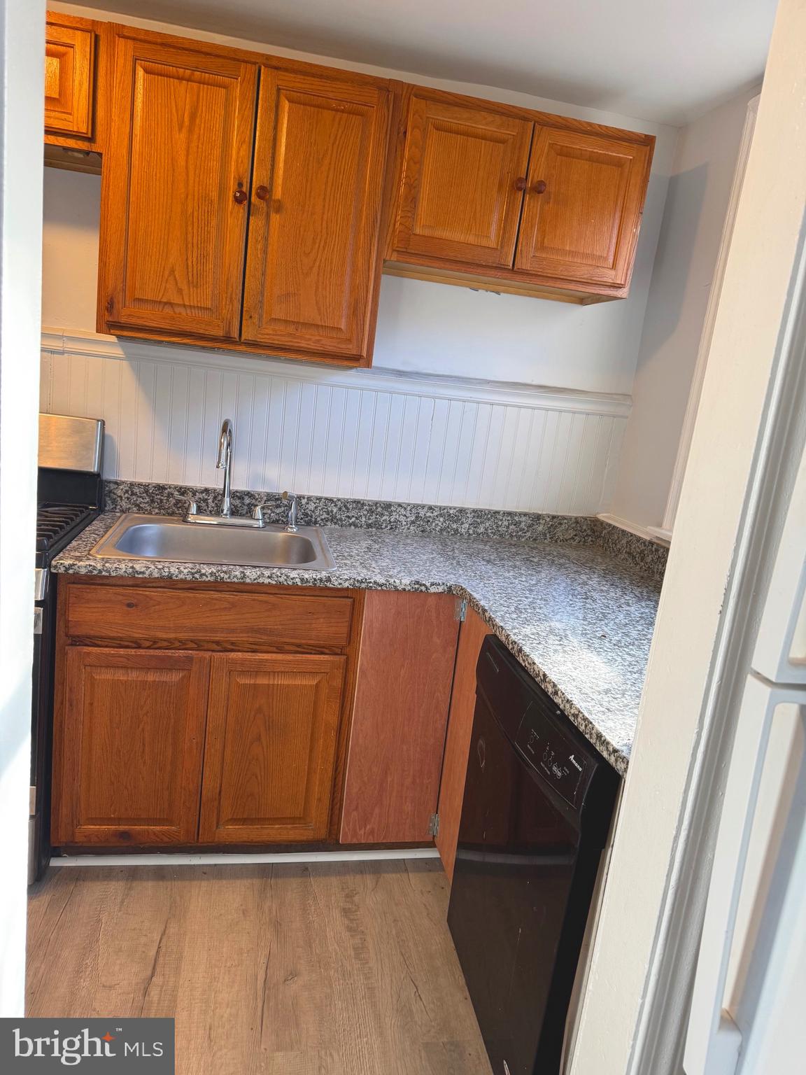 314 Copley Road Upper Darby, PA 19082 - Photo 6 of 11 a kitchen with granite countertop cabinets washer and dryer