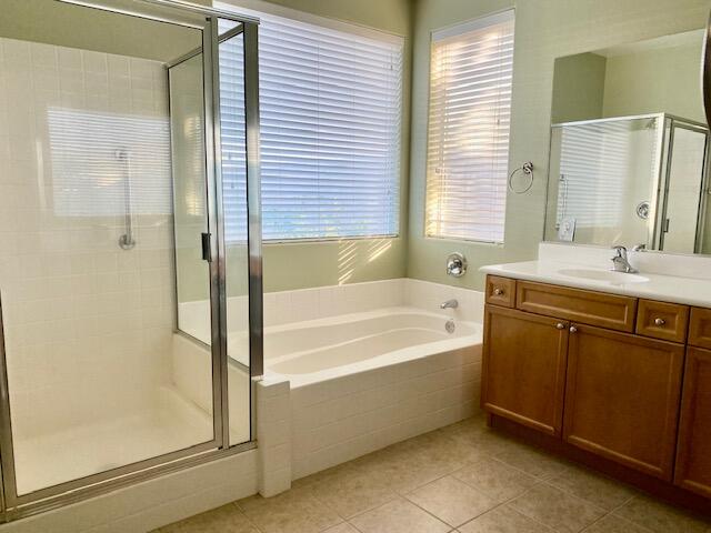 83346 Lone Star Road Indio, CA 92203 - Photo 5 of 12 a bathroom with a tub sink shower and a mirror