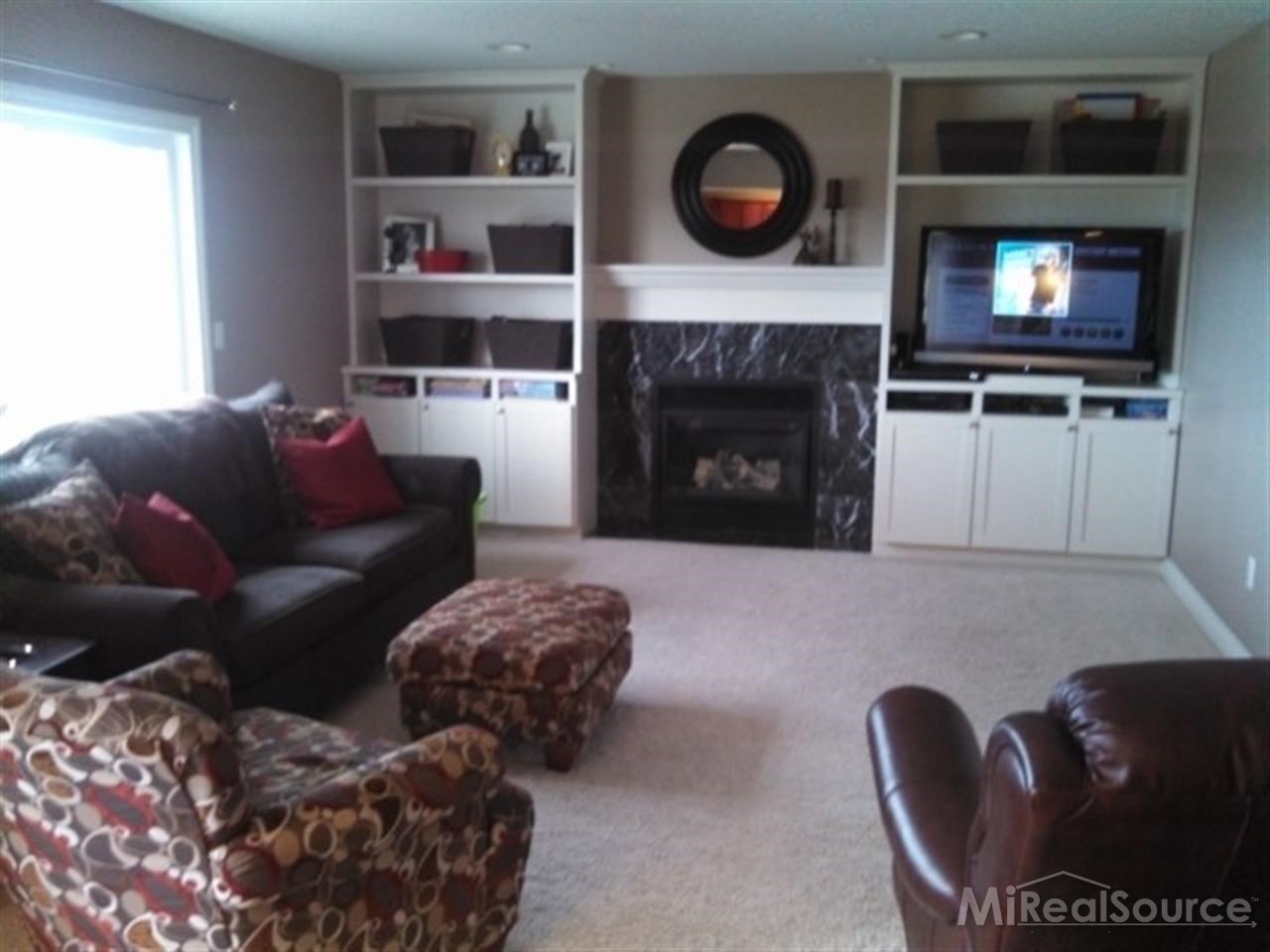 2581 Capac Road Allenton, MI 48002 - Photo 7 of 15 This is a view of the living room.