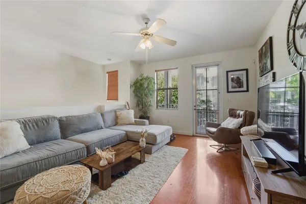 a living room with furniture or couch and a window