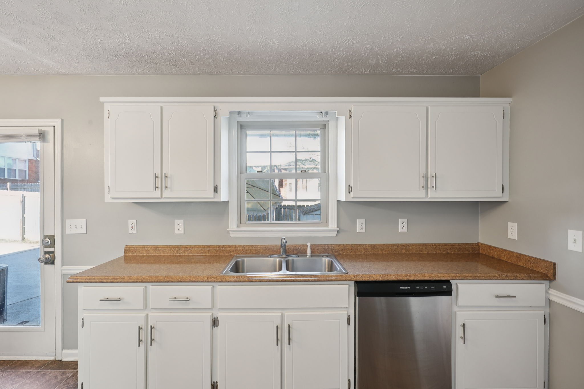 403 Acorn Court Smyrna, TN 37167 - Photo 13 of 34 a kitchen with granite countertop white cabinets and sink