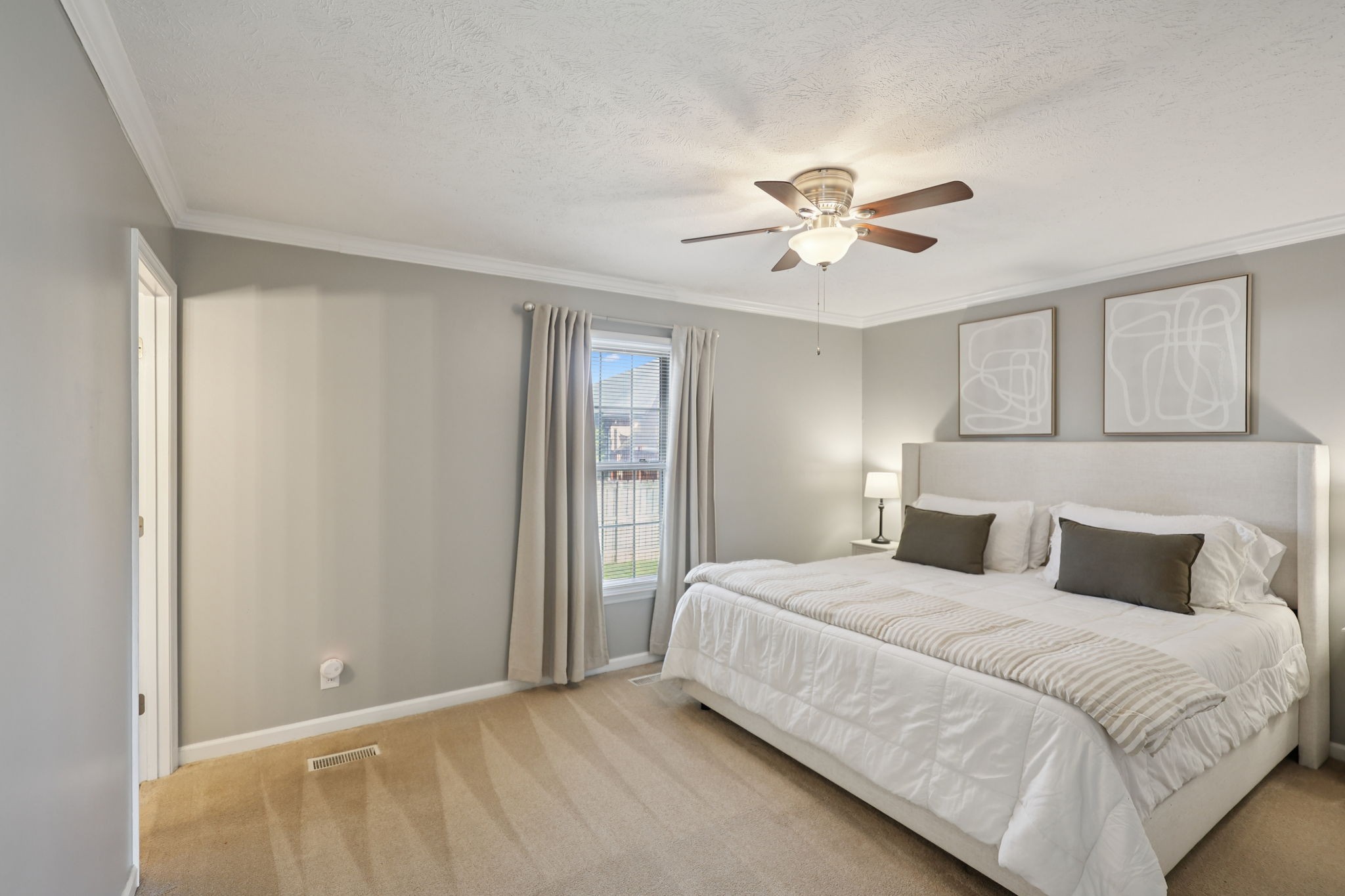 403 Acorn Court Smyrna, TN 37167 - Photo 15 of 34 a bedroom with a bed and a ceiling fan