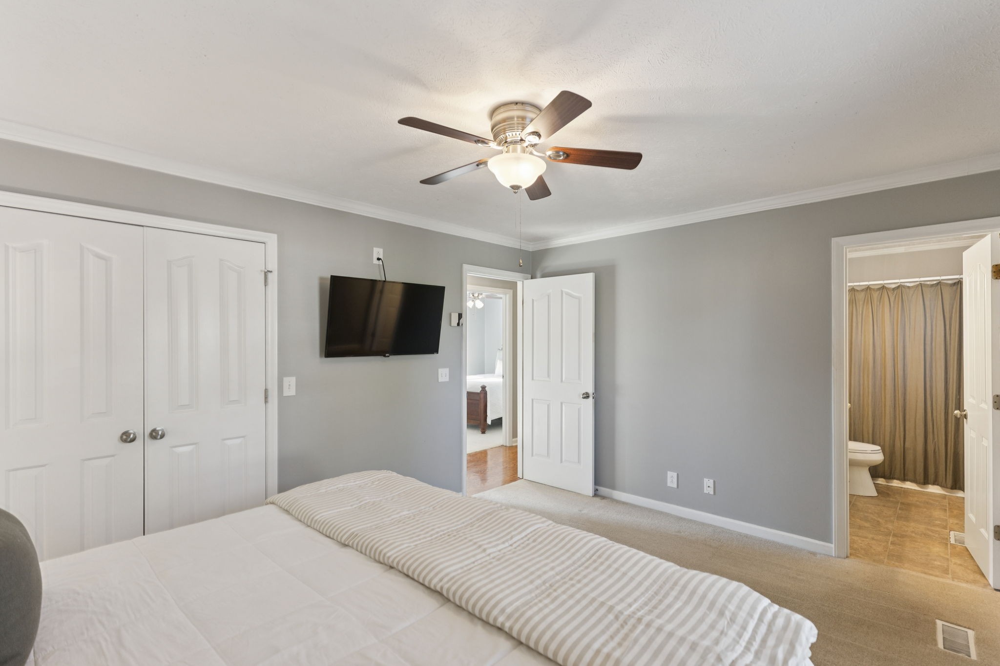 403 Acorn Court Smyrna, TN 37167 - Photo 16 of 34 a bedroom with a bed and a flat screen tv