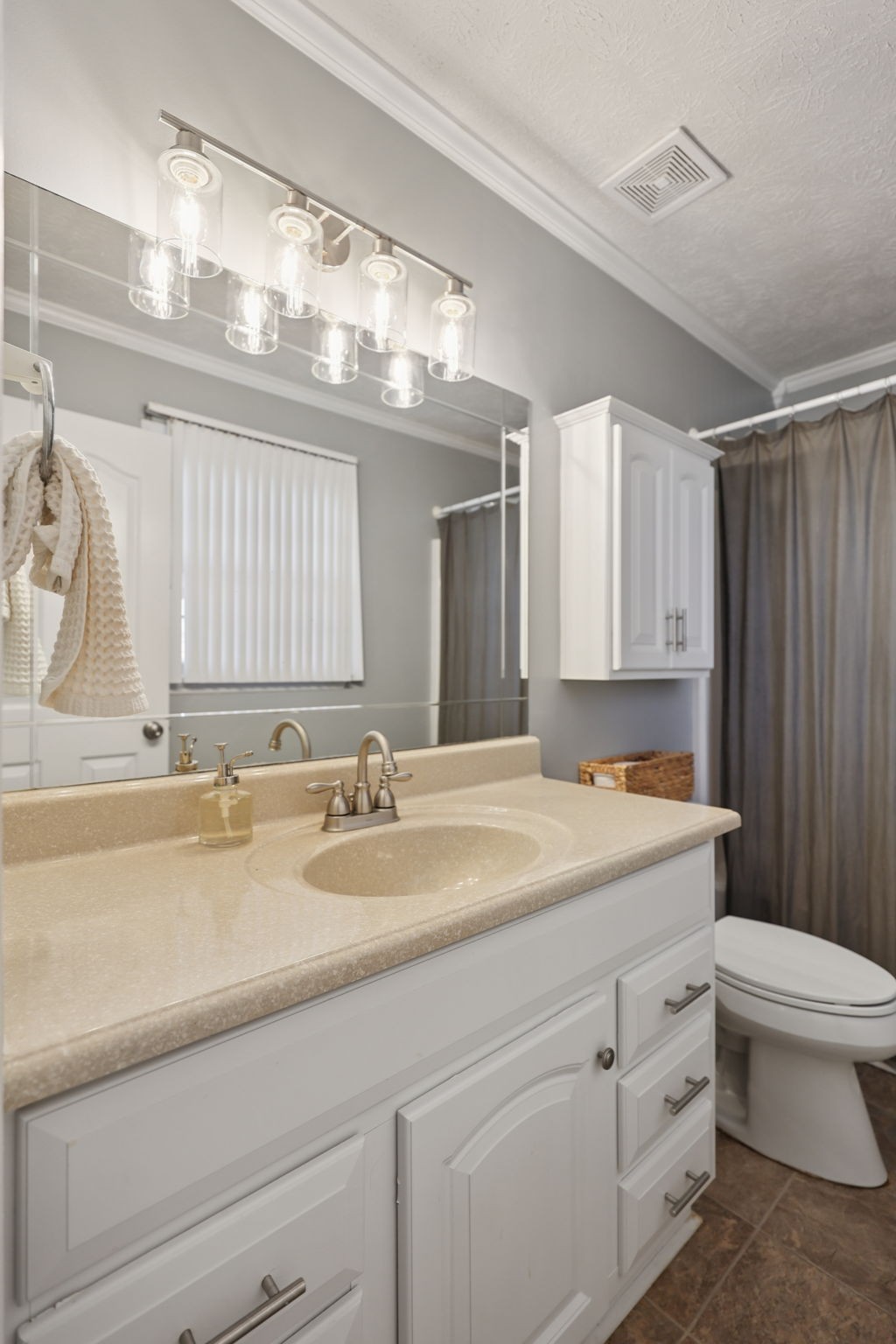 403 Acorn Court Smyrna, TN 37167 - Photo 18 of 34 a bathroom with a sink a toilet and a mirror
